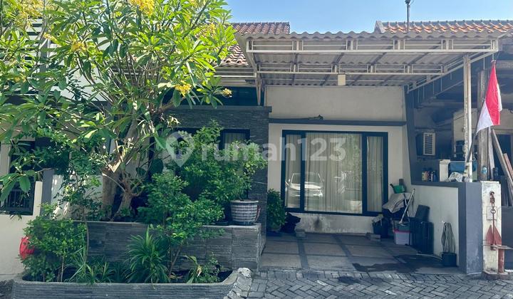 Affordable 1-Story Minimalist House, Well-Maintained and Move-In Ready, Near Modern Market in Taman Puspa Raya, Citraland Utama, West Surabaya