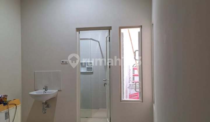Affordable 1.5 Story Minimalist Modern Semi-Furnished Ready-to-Occupy House Near Modern Market in Taman Puspa Raya, Citraland Utama, Surabaya Barat. 2