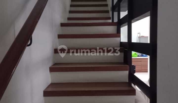 Luxurious 3-Story House with Swimming Pool in a Strategic Location in Kemang 2