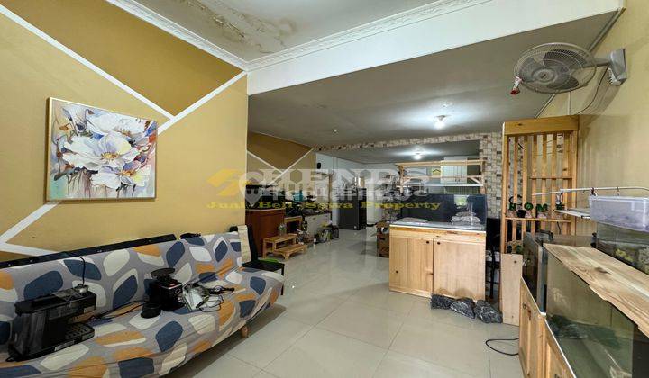ruang tamu rumah siap huni full furnish