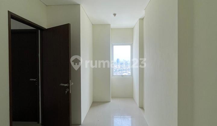 Dijual 1 Unit Apartemen North Land . Lb 41m². 2 Br. Lantai 18. Hadap Monas .