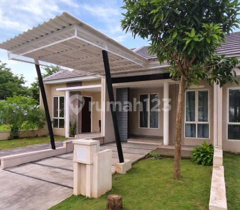 Rumah 1 Lantai Semi Furnished AC di Suvarna Sutera 1Ka00011