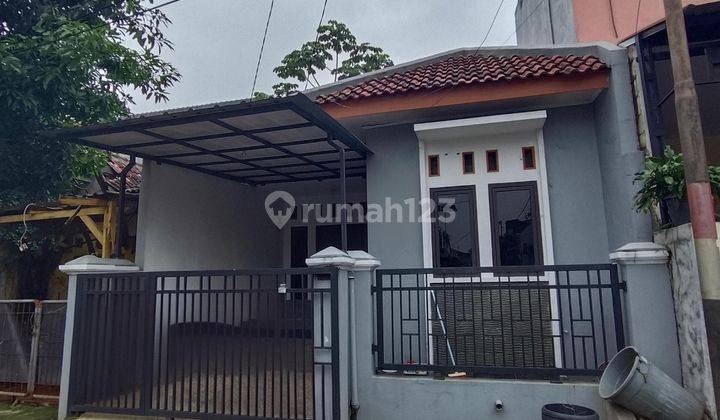 Dijual rumah siap huni di Perum Puri Gading, Jatimelati, Pondok Melati, Bekasi 1