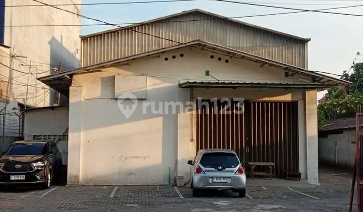 gudang pinggir jalan raya luas 1225 hitung tanah 32 jt permeter masih nego