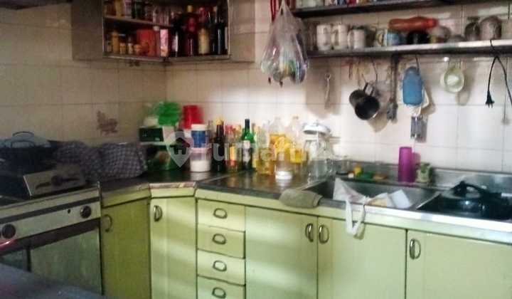 Rumah Kayu Putih Pinggir Jln Raya Luas 563m Hadap Selatan  2