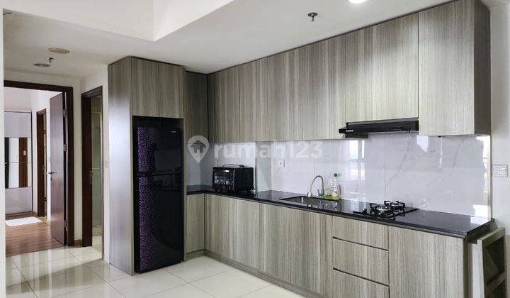 DI JUAL RUGI APARTEMEN MTOWN 2BR FULL FURNISH DI GADING SERPONG 1