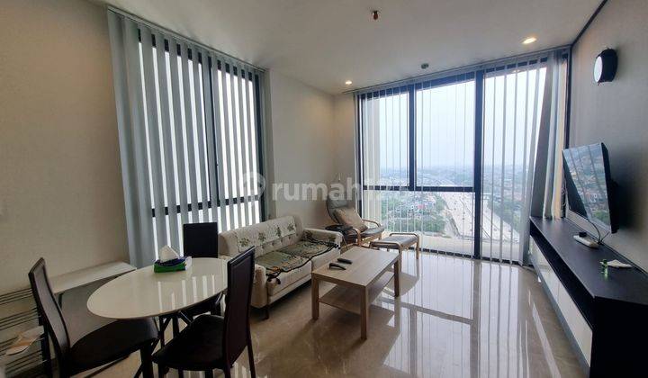 ruang makan disewakan izzara apartment 1br furnished