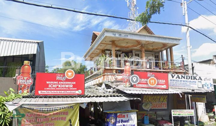 Rumah dan ruangan usaha lokasi sangat strategis 1