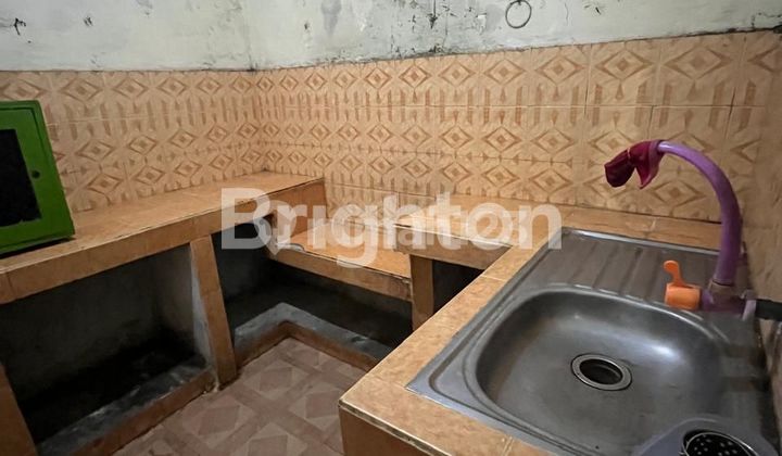 Rumah dan ruangan usaha lokasi sangat strategis 2