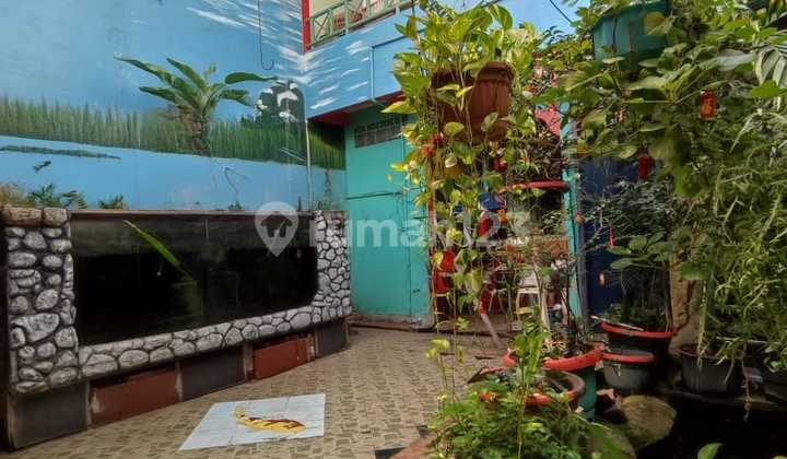 Harga Bagus! Rumah dengan Taman Indoor + Kolam Ikan di Graha Raya Harga Bagus! Rumah dengan Taman Indoor + Kolam Ikan di Graha Raya