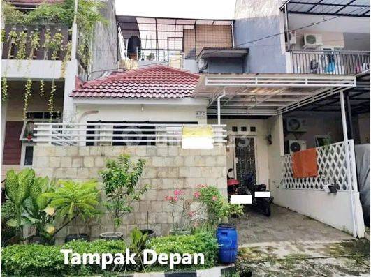 Rumah 1,5 lantai di cluster bebas banjir Graha Raya 2