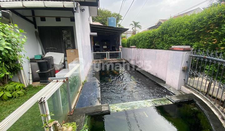 Corner House with Large Area in Graha Raya, Location Near Parigi Toll Gate 2