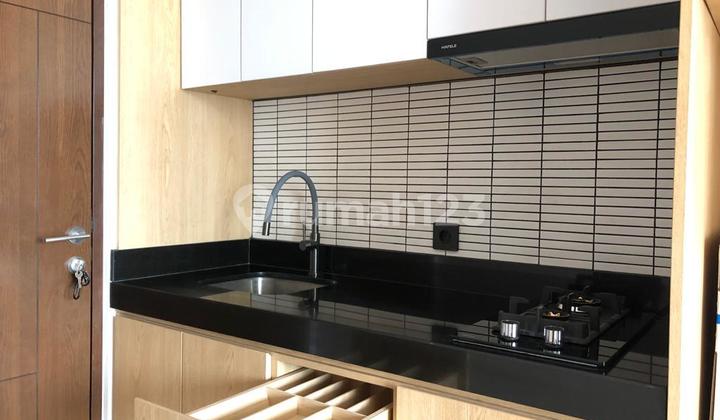 Apartment The Newton 1 1 BR Furnished Bagus 2