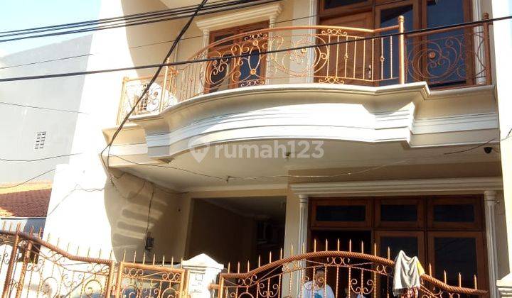 Rumah 2,5 Lantai Luas 180m² Furnished di Jl. Tanjung Duren Jak Bar 1