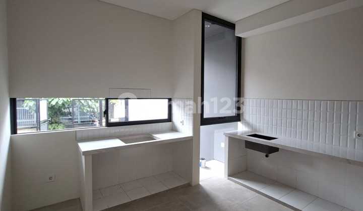 Rumah Model Townhouse di Taman Alfa Indah 2