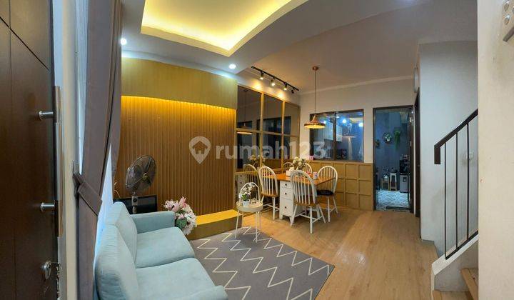 Disewa Rumah Bagus dan Cantik  2 Lantai Full Furnish Di Graha Raya 2 Lantai SHM Sudah Renovasi Selatan Rumah 1