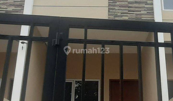 Rumah model ruko area tomang pinggir jalan besar 1