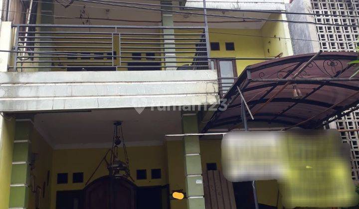 Rumah Strategis Harga Menarik  Di Graha Raya 1