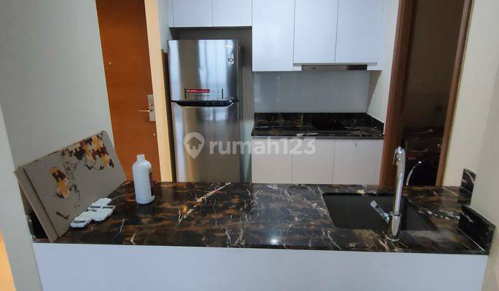 Disewakan apt taman anggrek residence 2kt condo semifurnish  1