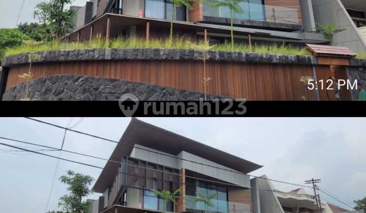 Tropical House With Waterfall di Manyar Surabaya Timur Dekat Dharmahusada