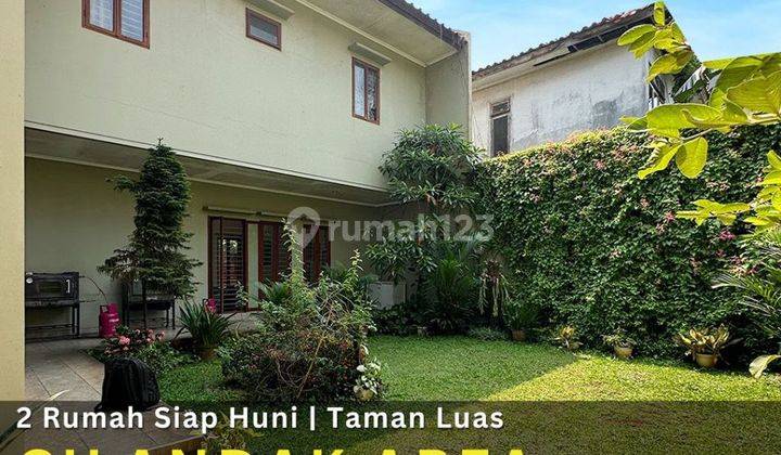 Rumah 2 Bangunan 2 Lantai Taman Carport Luas 1