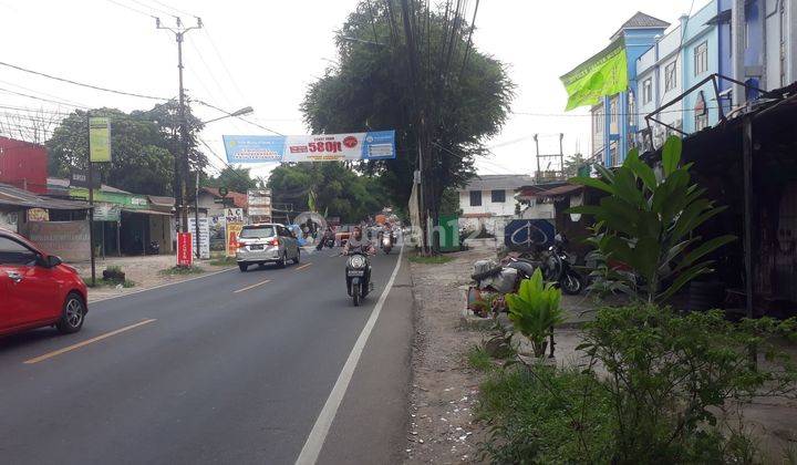 Tanah beserta kios pinggir jalan raya di Sawangan, Depok  (DW) 2