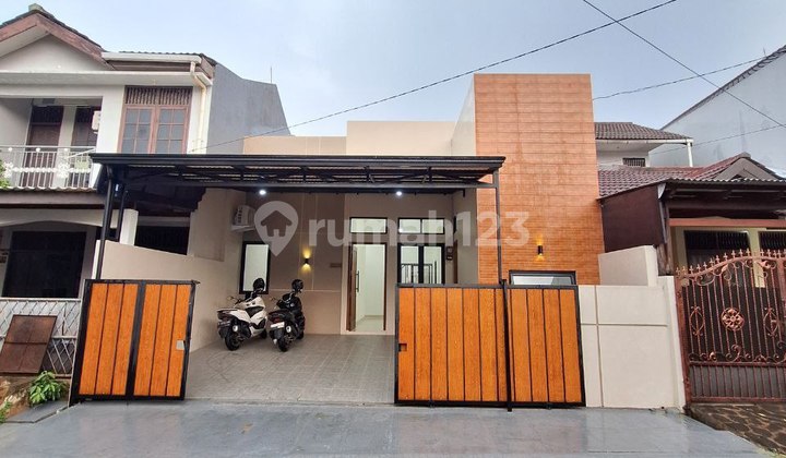 New 2-Story House with Large Land in a Complex, Access for 2 Cars in Ciputat 2