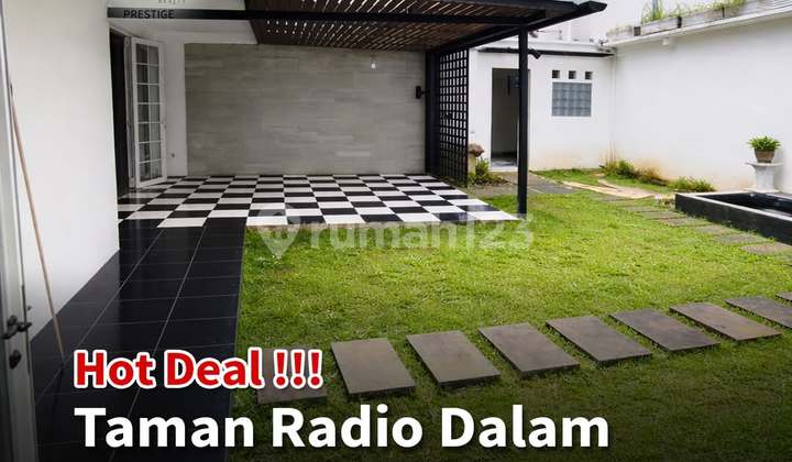 For Rent: Radio Dalam Garden House, Suitable for Office or Residence  
Land Area: 350M  
Building Area: 300M  
Building: 1 Floor  
Bedrooms: 2 + 2 (Maid's Quarters)  
Bathrooms: 2 + 1 (Maid's Quarters)  
Electricity: 16,000 Watts  
Garage + Carport: 1 + 1  
Street Parking for 2 Cars  
Rent Price: 270M/Year 1