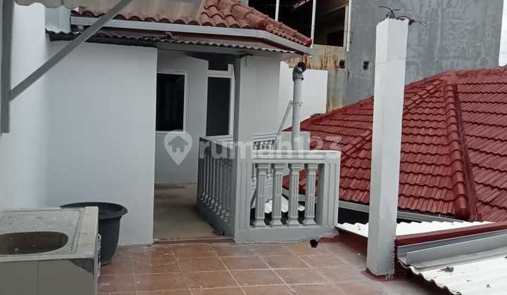 FOR SALE BEAUTIFUL WELL-MAINTAINED HOUSE WITH FRONTAGE ON WIDE STREET IN KEDUNG BARUK SURABAYA CITY LA 432 2