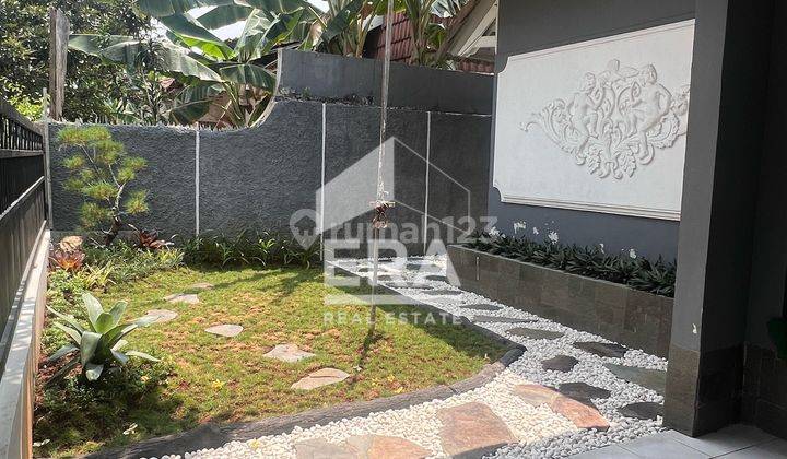 garasi/carport rumah asri terawat di cinere