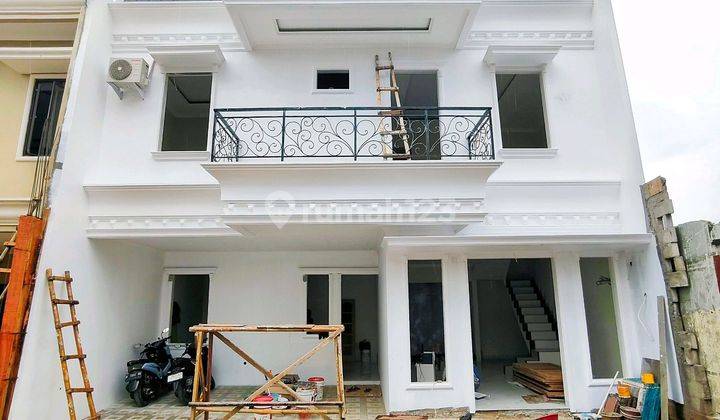 Rumah Plus Rooftop Cluster Akses 2 Mobil Pejaten Jaksel 1