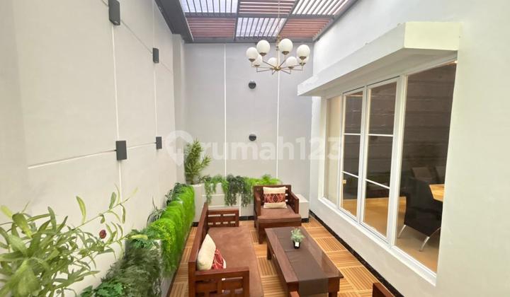 For Sale: Split-Level 2-Story HouseIn a Cluster, Garden View, Land Area 180m2, 4+1 Bedrooms, Unfurnished, Only 500m from Living World Mall, and 1km from the Tambun Grand Wisata Toll, Bekasi