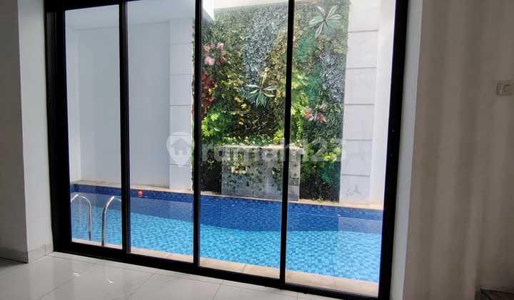Rumah Minimalis dengan Kolam Renang Dalam Perumahan di Bintaro Sektor 9 2