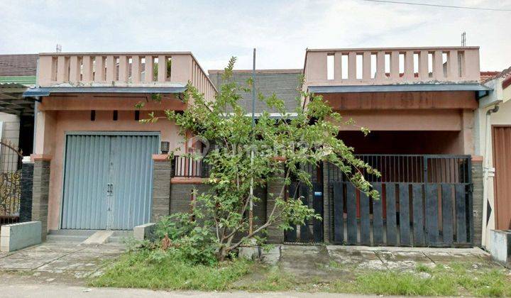 Rumah kokoh pinggir jalan cocok Untuk usaha  hadap Utara  1