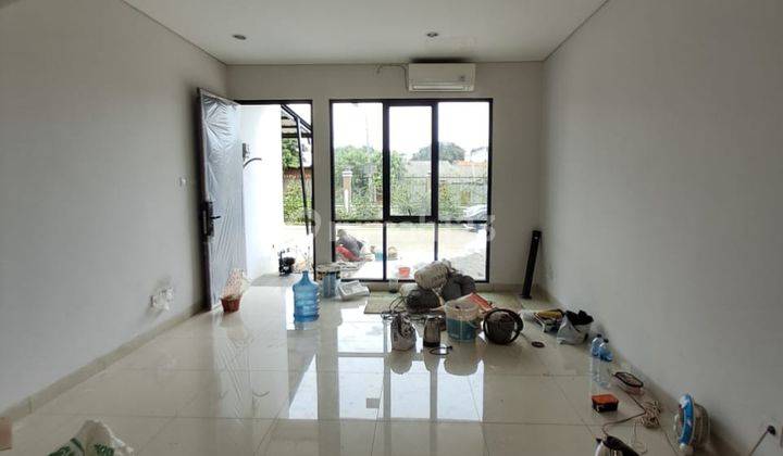 Disewakan cepat rumah baru siap huni dalam cluster di Royal Palm Blossom , Taman Surya , Jakarta Barat  1