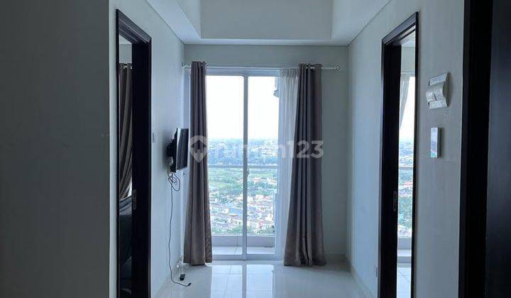 Dijual Apartemen Puri Mansion Connecting 2 Kamar Tidur Luas 27m2 + 37m2 Tower Chrystal Semi Furnished 1