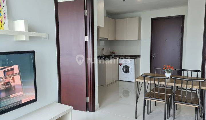 Disewakan Apartemen Puri Mansion Tower Amethyst 2 + 1 Kamar Tidur Luas 63m2 Lantai Tinggi View Kota Full Furnish 1