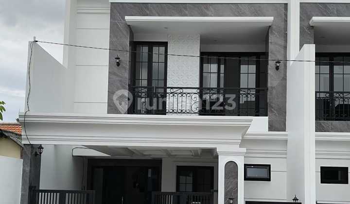 Cn40 Jual Rumah Baru Modern Klasik di Perumahan Elite Araya Surabaya Timur