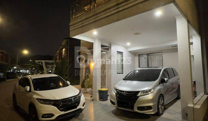 Rumah minimalis 2 lt,semi furnished, bagus, cluster ,di GrahaRaya 1