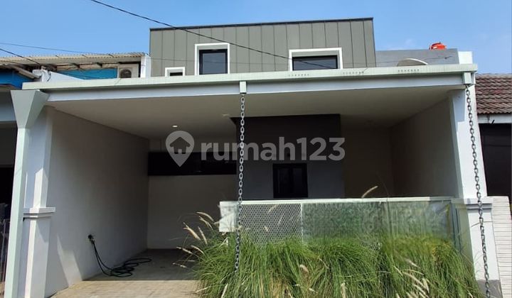 Di Jual Rumah Minimalis di Graha Raya bisa KPR Lokasi Nyaman