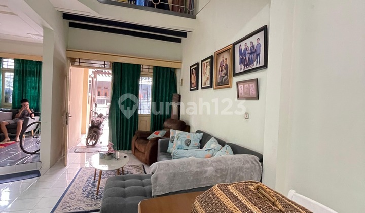 Affordable 2-Story House with 2-Car Garage on Antapani Street 2