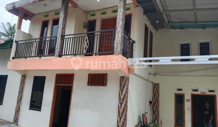 House by the Cross-Sumatra-Solok Road 2 Shophouses 3 Rentals House by the Cross-Sumatra-Solok Road 2 Shophouses 3 Rentals