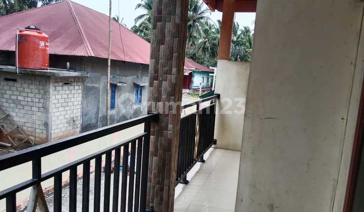 House by the Cross-Sumatra-Solok Road 2 Shophouses 3 Rentals House by the Cross-Sumatra-Solok Road 2 Shophouses 3 Rentals