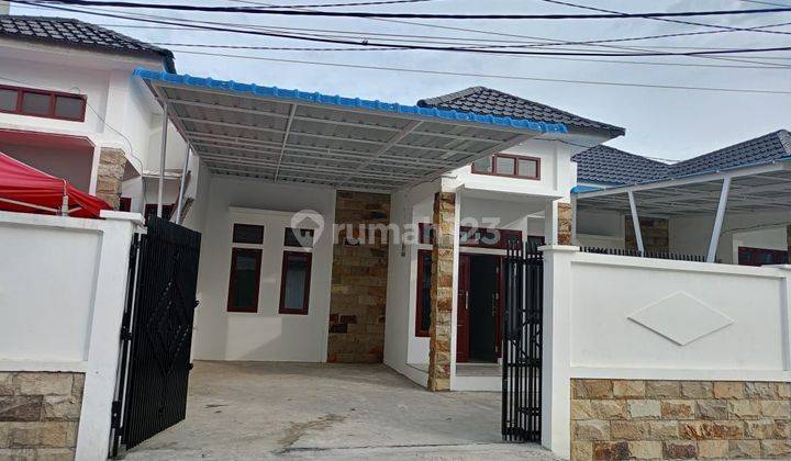 Miliki Rumah Pribadi Dengan Pagar Aman Dan Carport Eksklusif 2