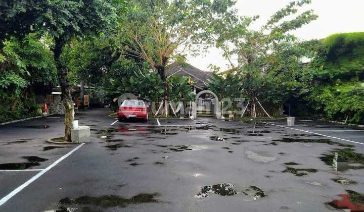 For Sale: Land and Building in Good Condition, Located in a Premium Area for Banking, Offices, and Showrooms, in Mlati, Yogyakarta.
