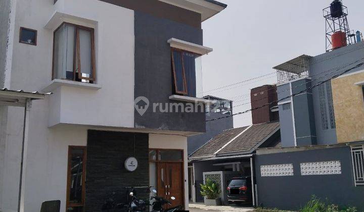 Rumah Modern Minimalis di Andaru Residence, Cinambo 1