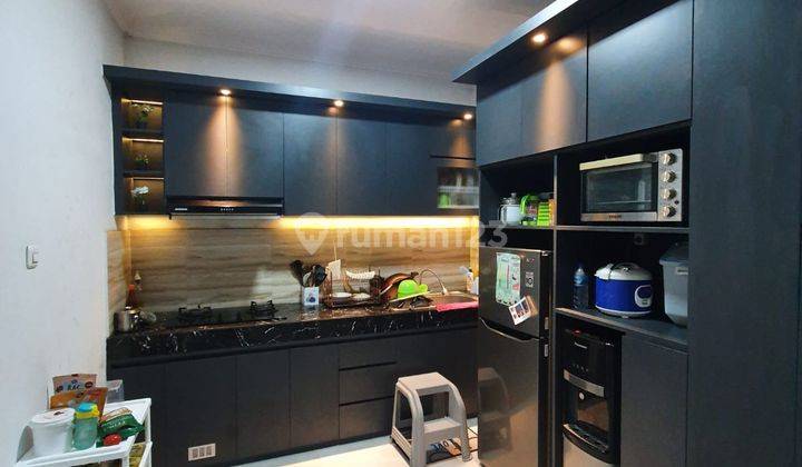 Rumah 2 Lantai Desain Minimalis Modern di Antapani 2