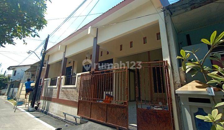 Rumah baru gress sudah tinggi dari jalan, di Tanahmas 1