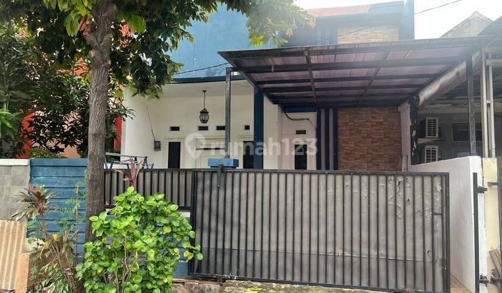 Rumah Bagus Unfurnished di Taman Harapan Baru, Bekasi B1222 1