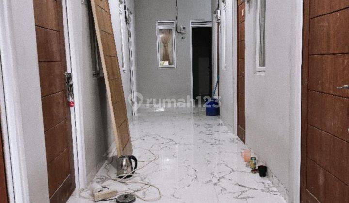 Rumah kost di Halim  pendapatan 25 jt / bln ( full terisi) dg 20 kamar letak strategis dekat halim 1